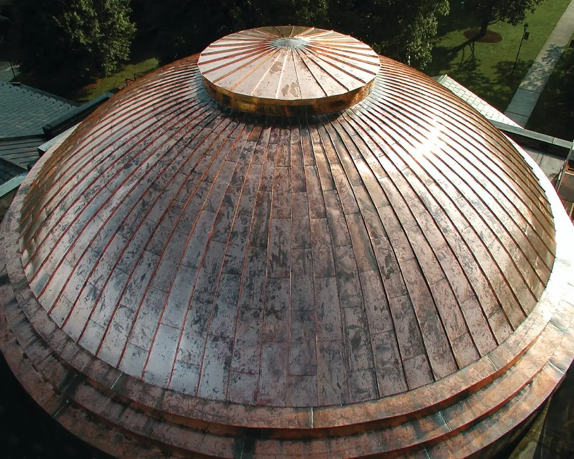 Craftsman Roofing crew installing a new roof in Newton